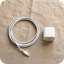 A white phone charger and cable returned as the corrected search result